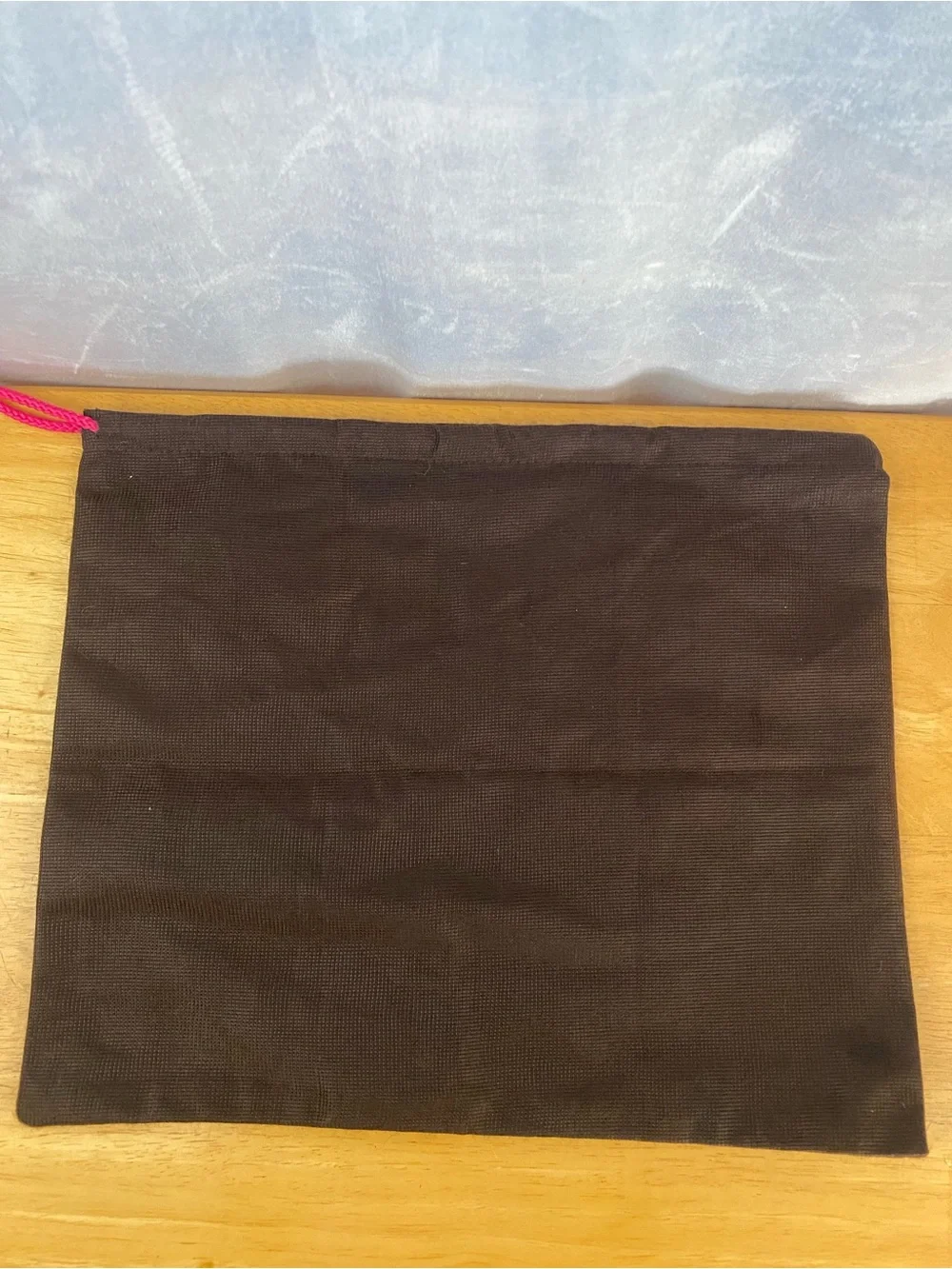 kate spade brown dust bag with pink drawcord and gold logo